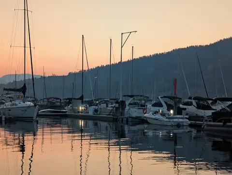Sailboats in the marina at dusk, Okanagan Lake at Okanagan Landing, Vernon, B.C., September 11, 2025